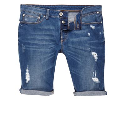 Mid blue wash skinny ripped denim shorts